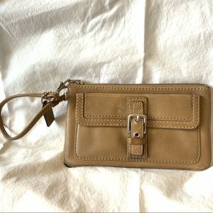 Coach wristlet with buckle